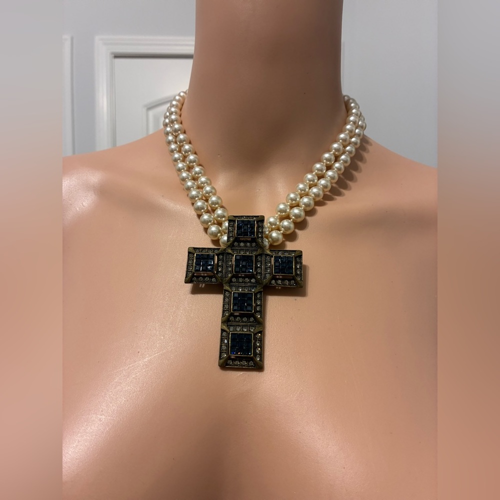 Elegant Pearl and Blue Cross Necklace
by Heidi Daus.